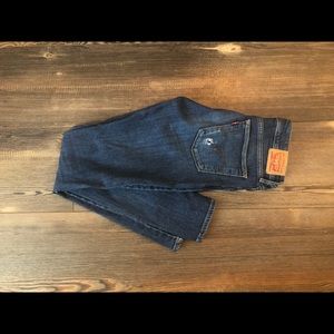 Levi’s distressed dark wash 711 jeans size 27